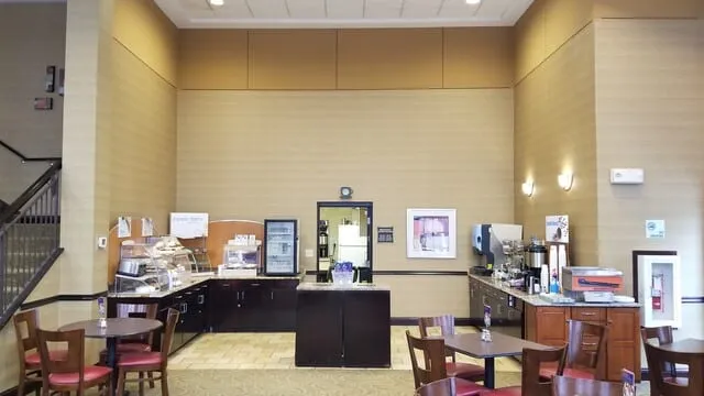 Custom millwork at an auto dealership by Pio Custom Cabinetry