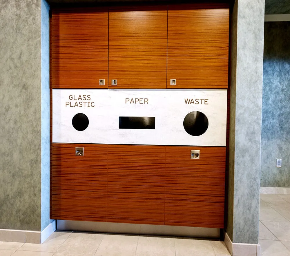 Custom millwork at an auto dealership by Pio Custom Cabinetry