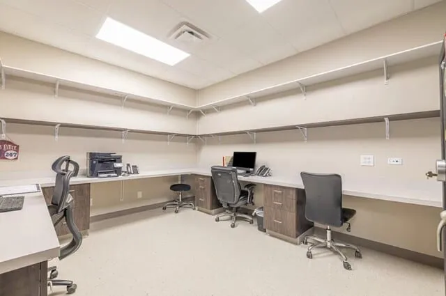 Custom corporate office millwork by Pio Custom Cabinetry