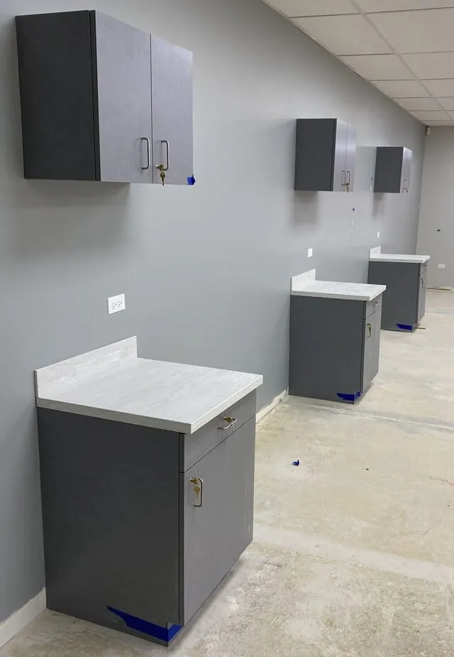 Custom corporate office millwork by Pio Custom Cabinetry
