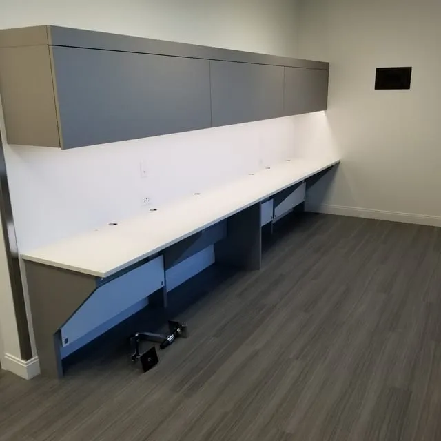 Custom corporate office millwork by Pio Custom Cabinetry