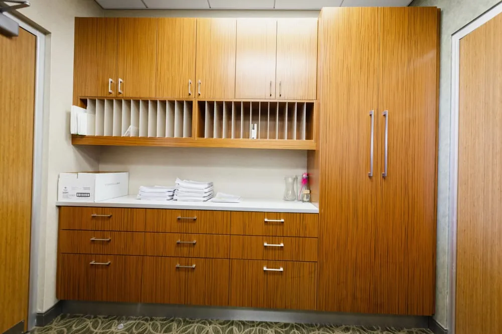 Custom corporate office millwork by Pio Custom Cabinetry