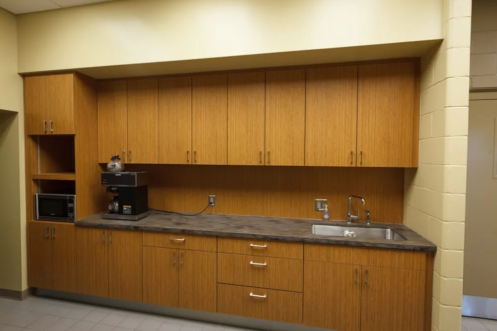 Custom corporate office millwork by Pio Custom Cabinetry