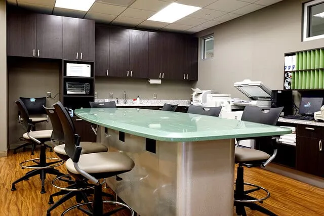 Custom corporate office millwork by Pio Custom Cabinetry
