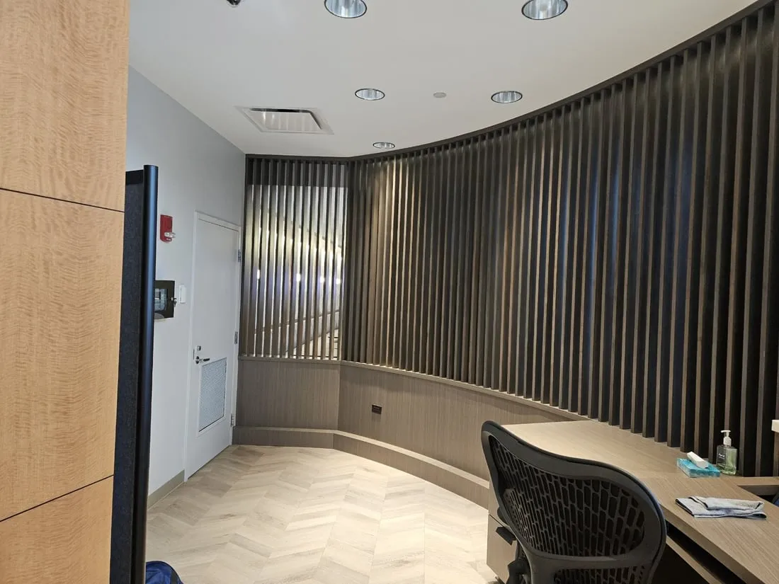Custom corporate office millwork by Pio Custom Cabinetry