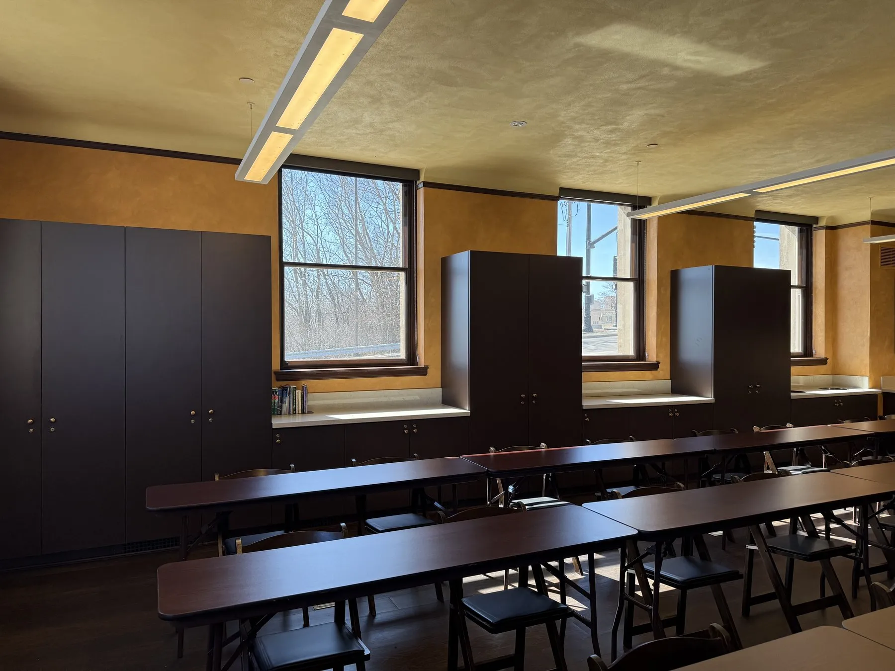 Detail of custom dark-wood library casework fabricated by Pio