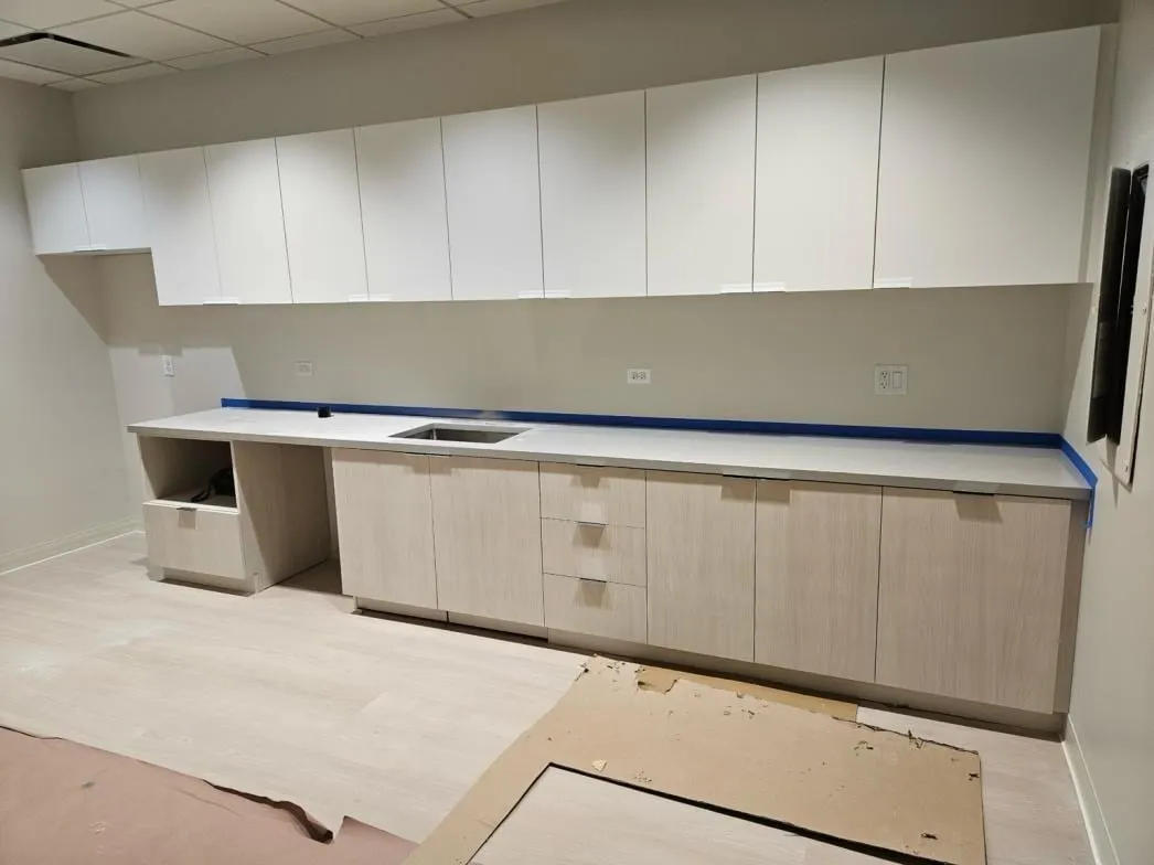 Custom corporate office millwork by Pio Custom Cabinetry