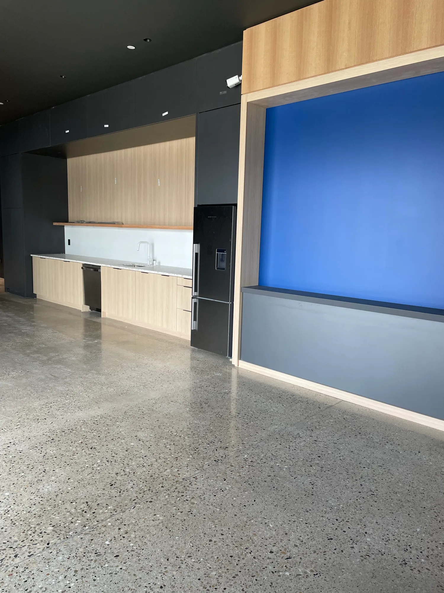 Custom corporate office millwork by Pio Custom Cabinetry