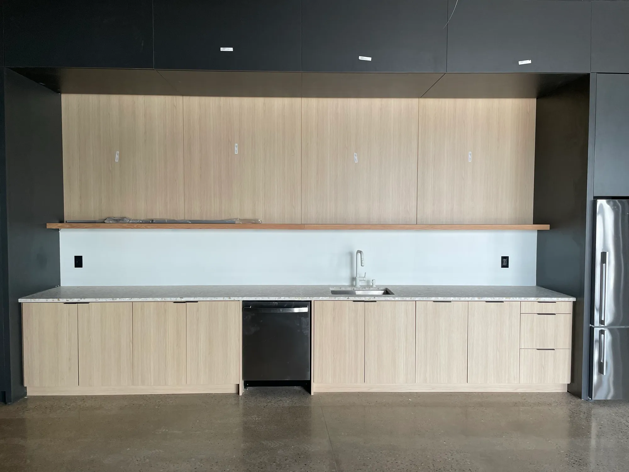 Custom corporate office millwork by Pio Custom Cabinetry