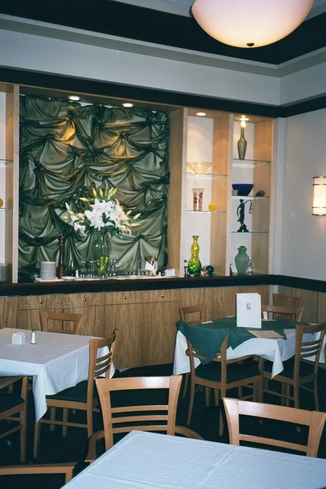 Custom restaurant millwork and seating by Pio Custom Cabinetry