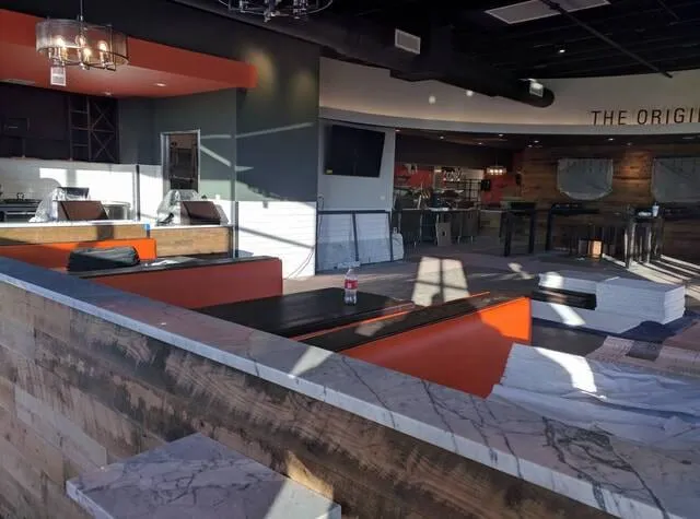Custom restaurant millwork and seating by Pio Custom Cabinetry