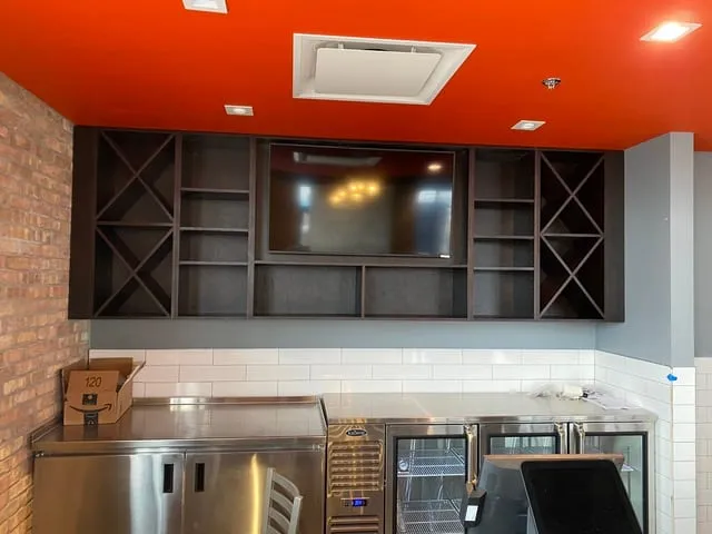 Custom restaurant millwork and seating by Pio Custom Cabinetry
